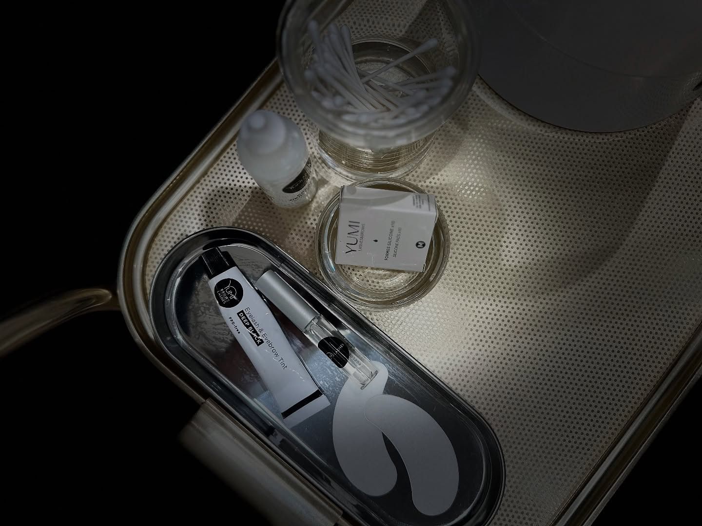 A YUMI lash lift kit laid out on a tray